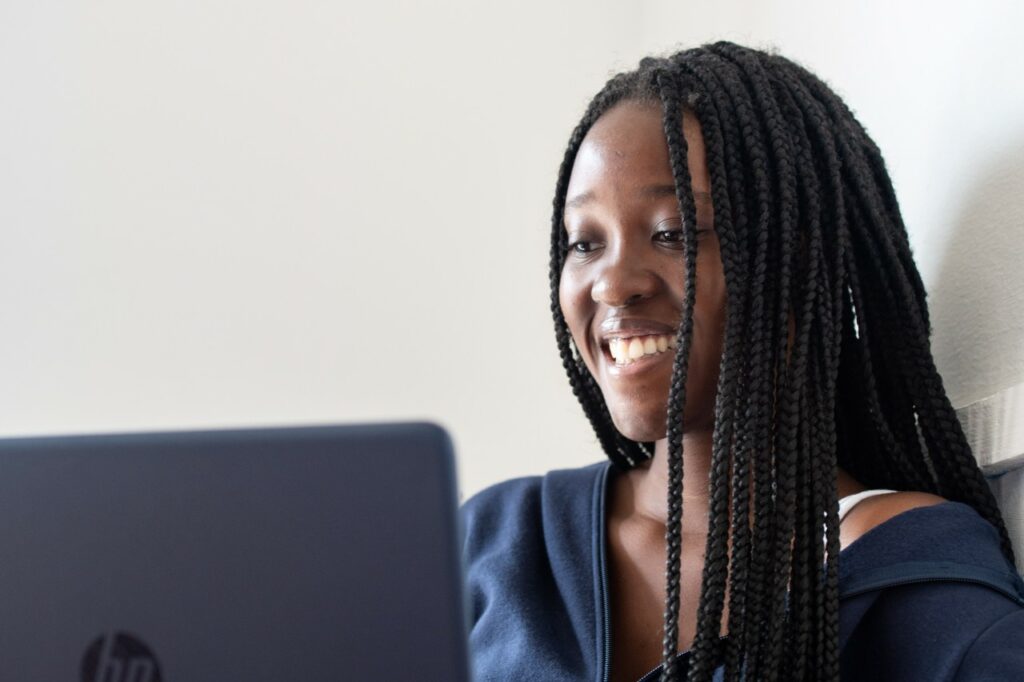 Young woman looking at laptop screen